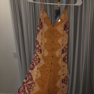 yellow patterned jumpsuit
